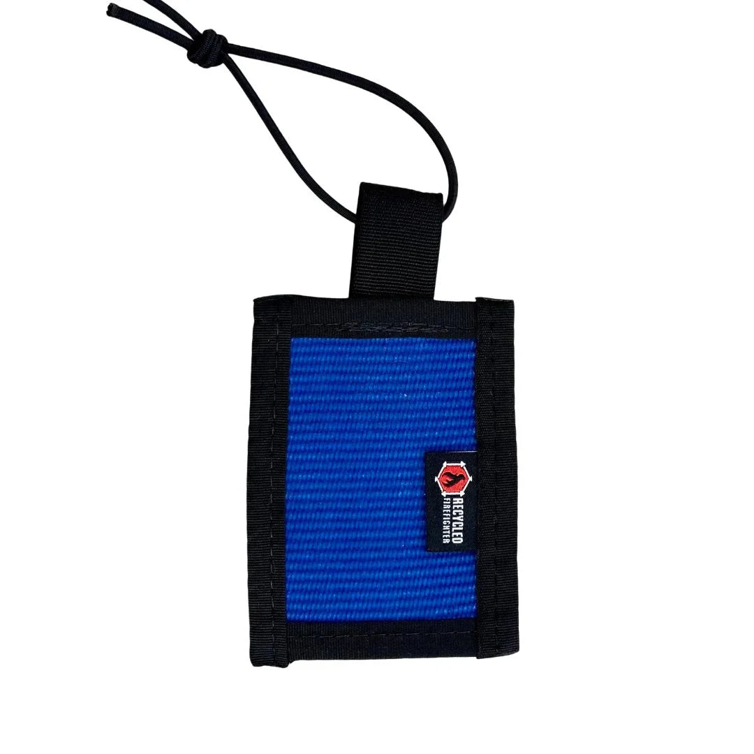 Recycled Firefighter firehose luggage tag in blue with black mil-spec nylon trim, handmade in USA from retired firehose
