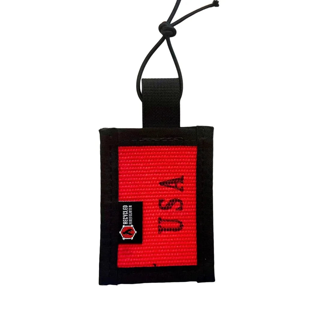 Recycled Firefighter firehose luggage tag in red USA colorway with black mil-spec nylon trim and elastic cord, upcycled firehose gift