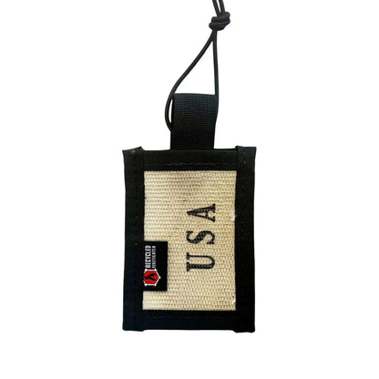 Back view of Recycled Firefighter firehose luggage tag showing clear plastic ID window with red firehose binding, made in USA