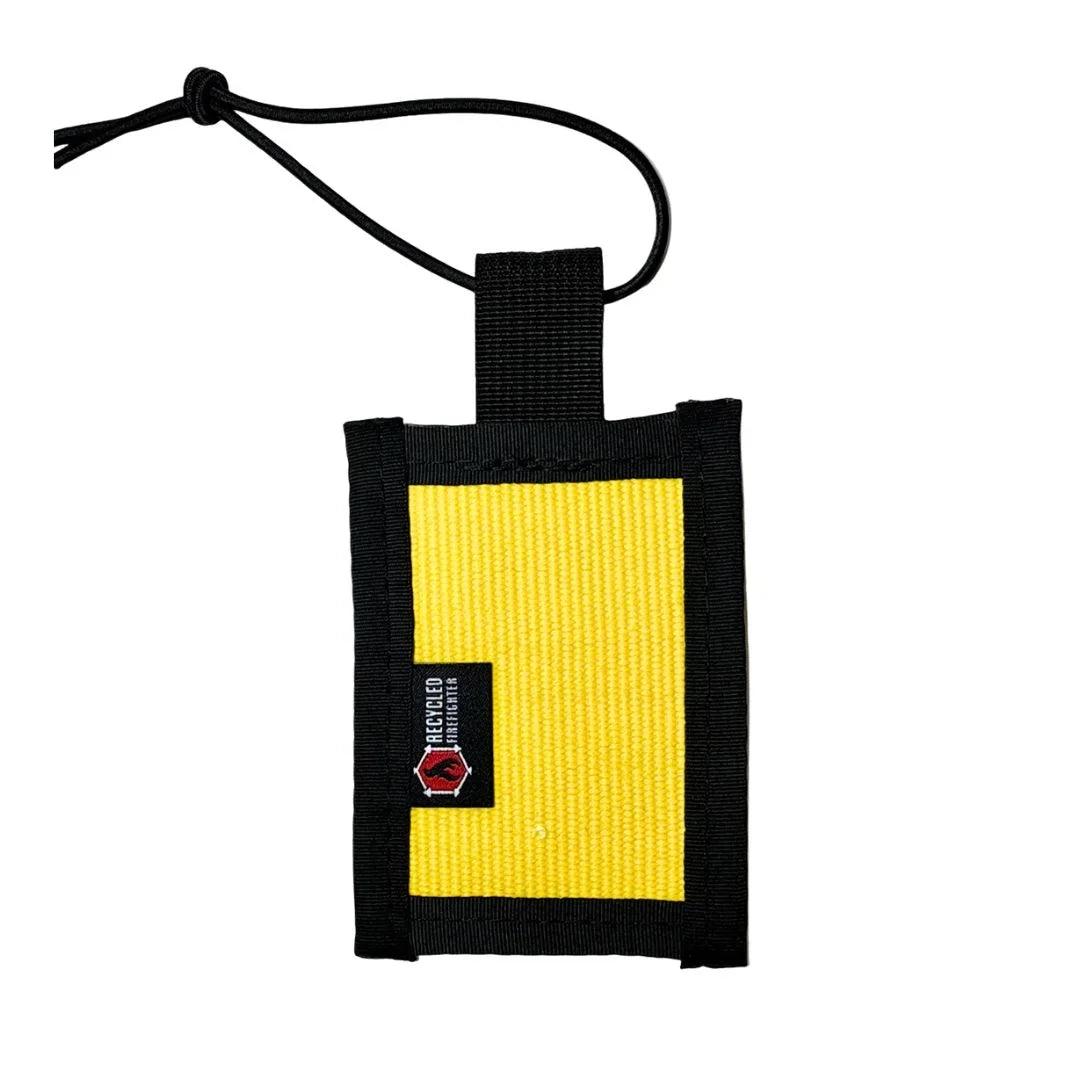 Recycled Firefighter firehose luggage tag in yellow with black nylon binding and elastic shock cord, unique firefighter gift made in America