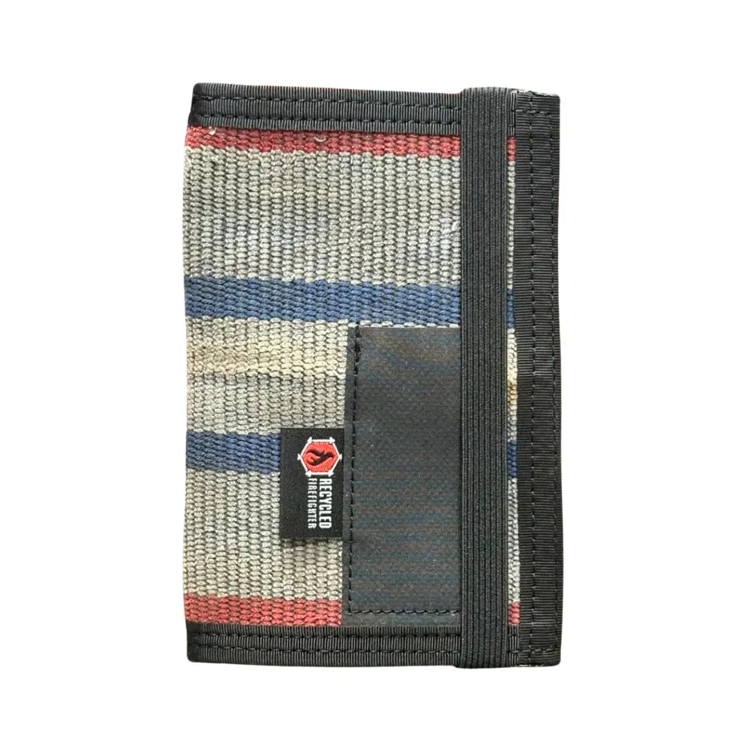 he Inspector recycled firehose notebook cover in Limited Edition Ocean Breeze 'Merica – gray, red, and blue horizontal stripe fire hose with black nylon edging and leather pen sleeve, handmade in USA