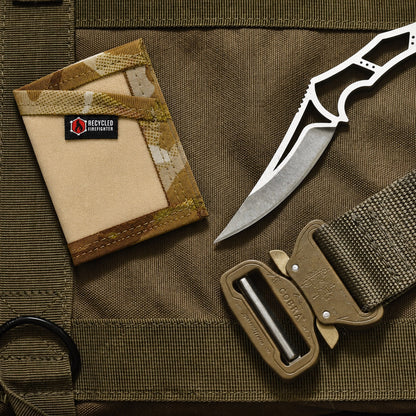Tactical knife and pouch on a brown tactical bag with 'Recycled Infantry' branding.